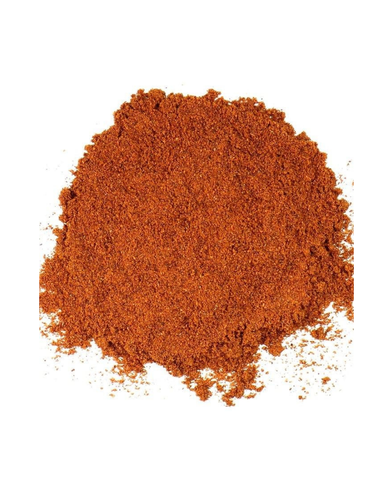 Dragonfly Herbs: beautiful rust red colored Chipotle powder on white background.